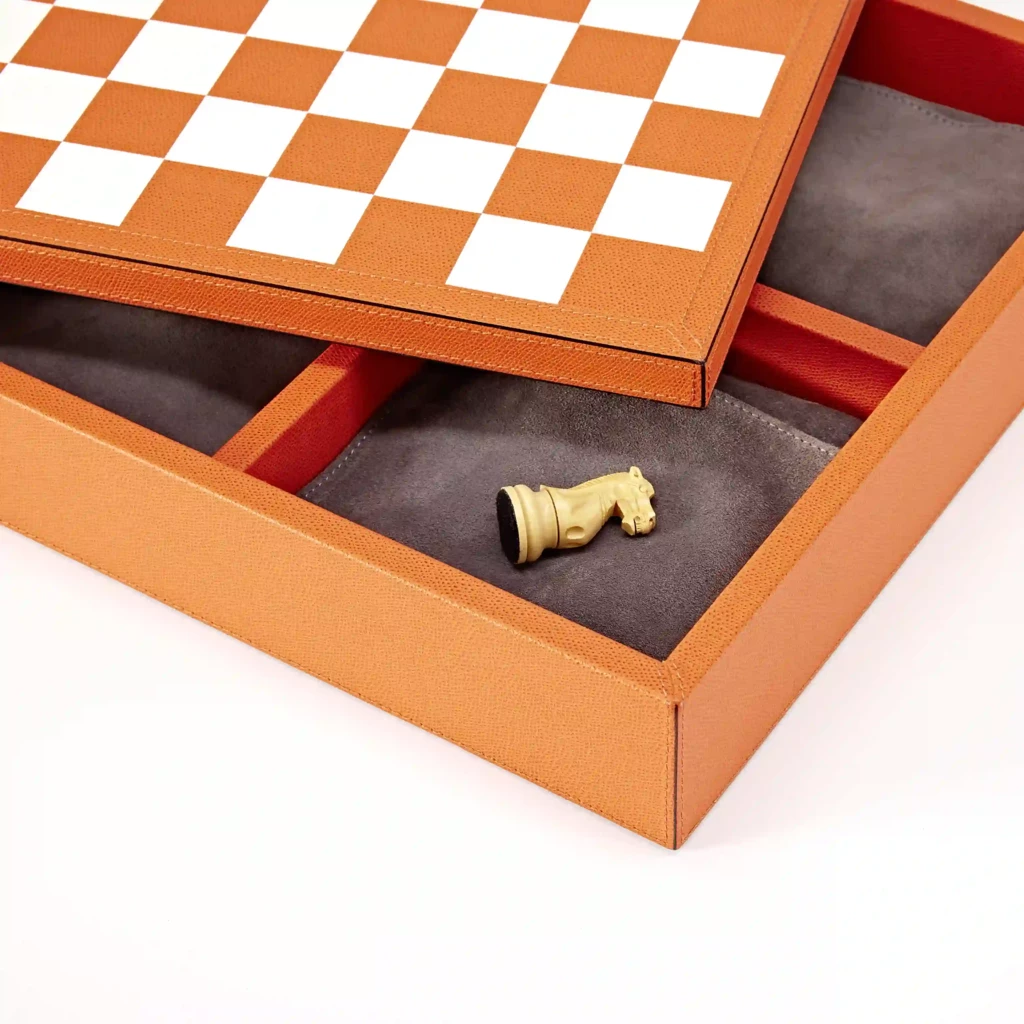 Compendium of Games (chess, dominoes, ...), leather, orange