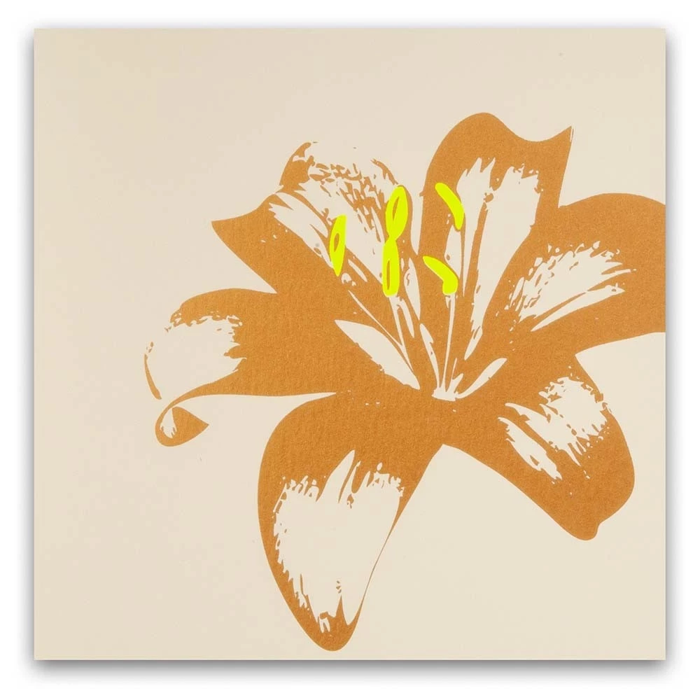Greeting card lily on pure sand